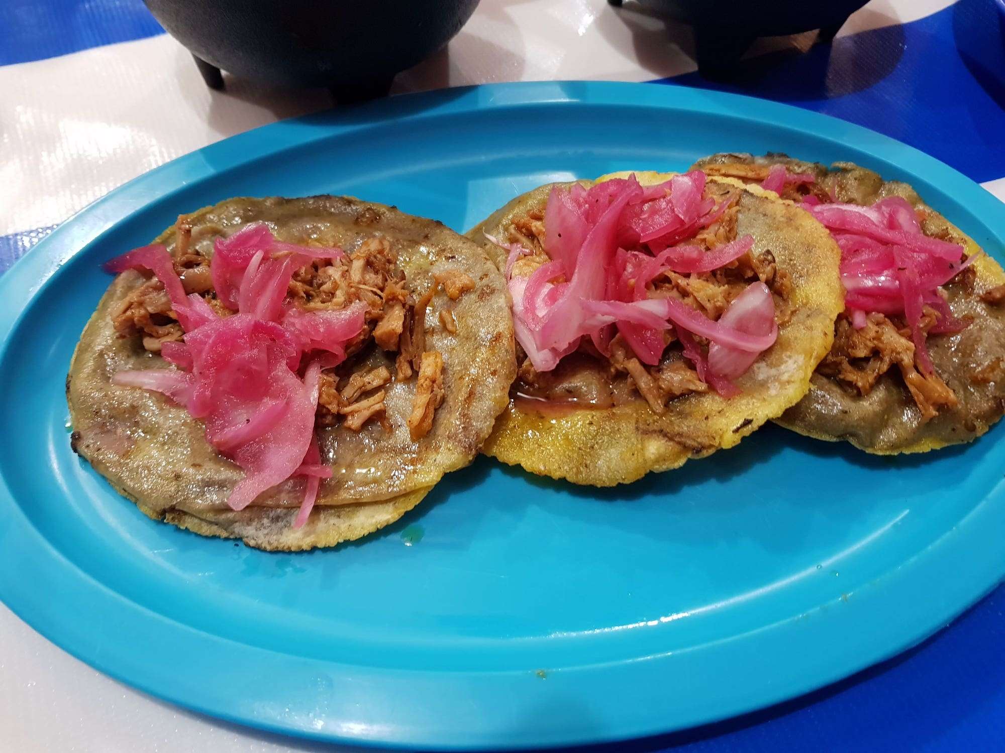 The Ultimate Tulum Travel Guide: Secrets of the Riviera Maya Unveiled 7 An order of Panuchos, a typical Yucatecan dish