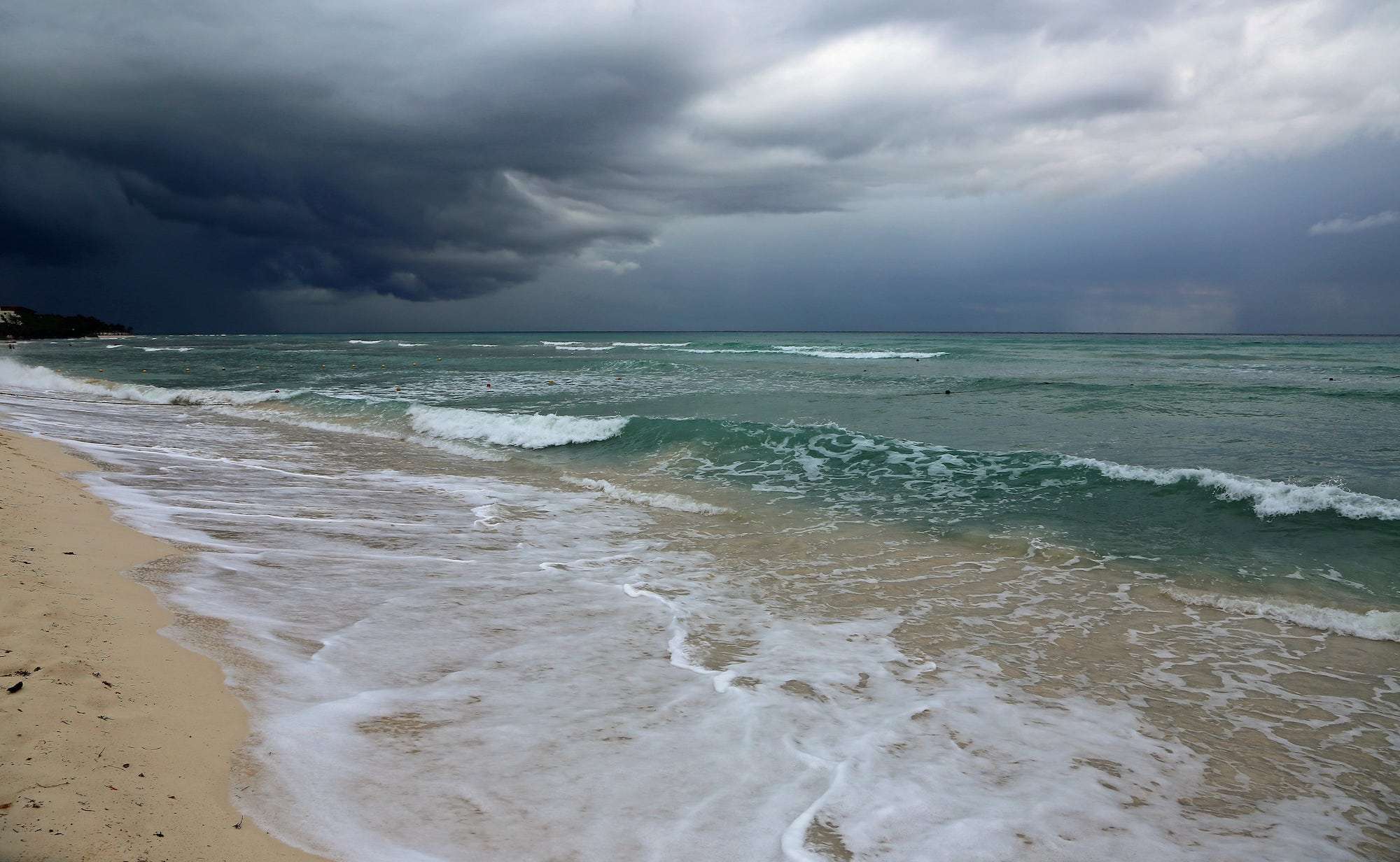 The Hidden Gem Between Tulum and Playa Del Carmen: A Complete Traveler's Guide to Akumal 3 Storm clouds on Caribbean Sea - Riviera Maya, Mexic-min