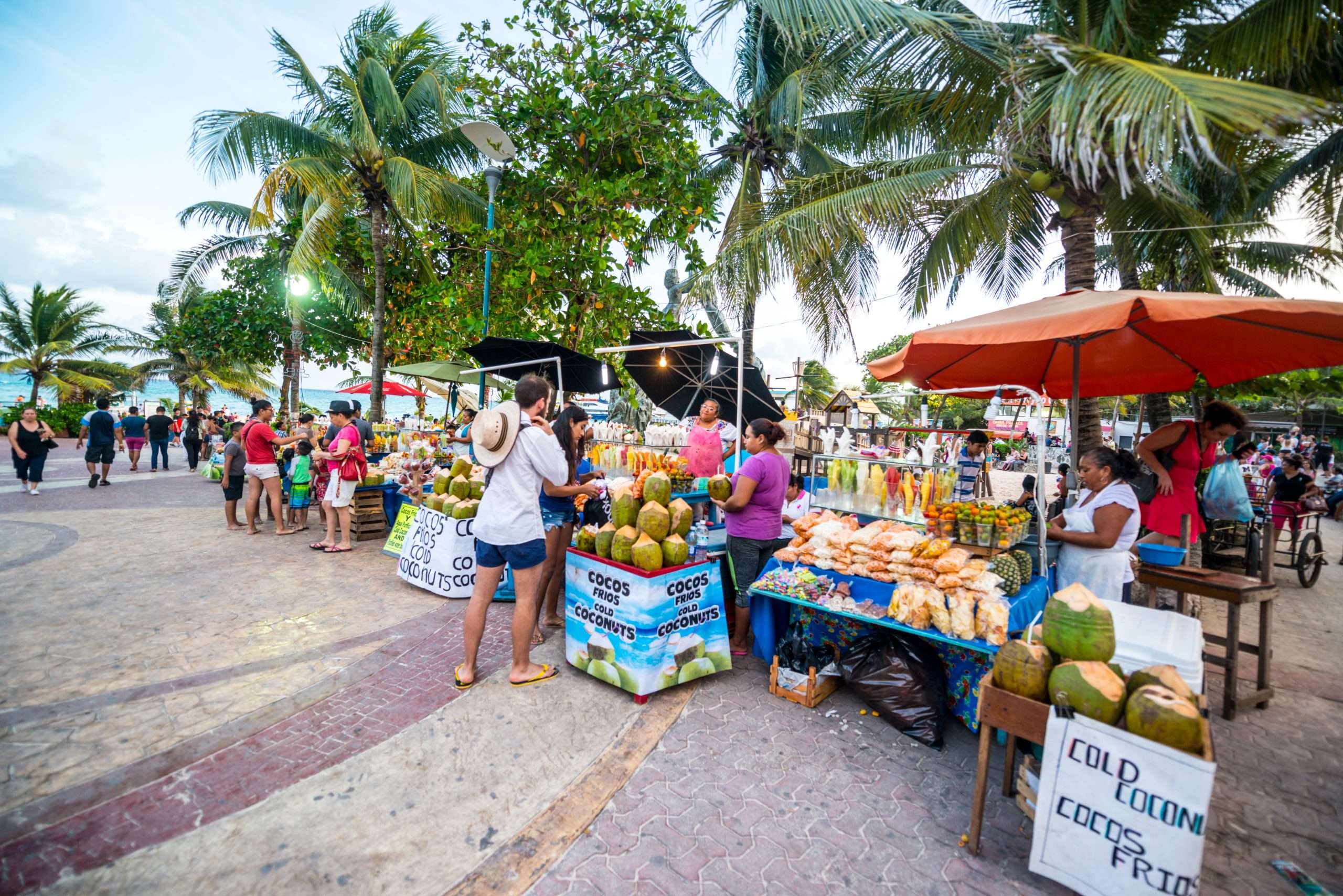 Planning Your Getaway: The Best Guide to Traveling in Playa del Carmen 2 street Market on Playa Del Carmen selling gifts, fruits and snacks