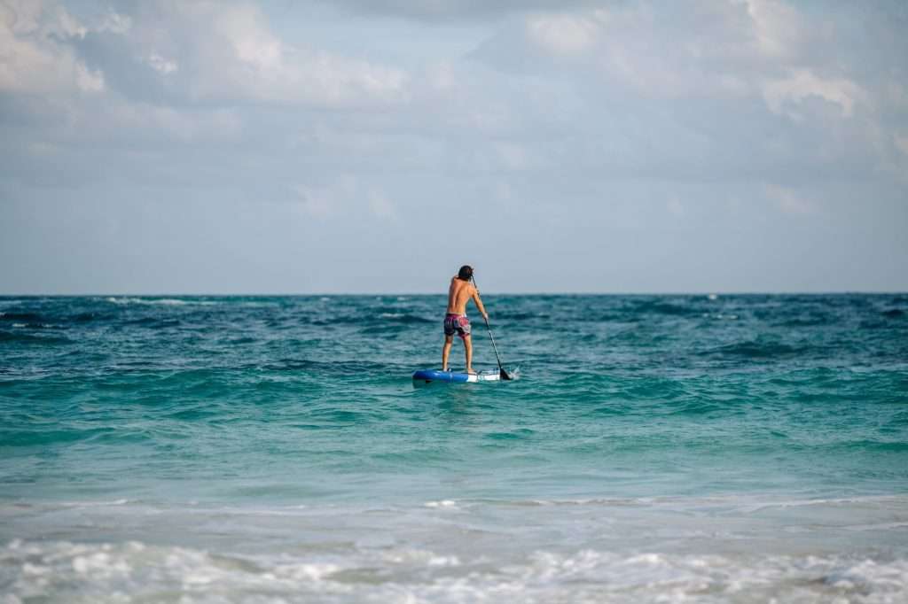 From Sea to Sky: Tulum’s Thrilling Adventure Activities 2 Paddleboarding min
