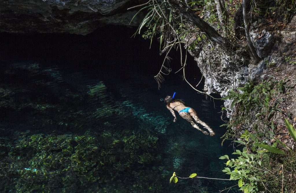 Cenotes of Tulum: Nature's Majestic Swimming Holes 1 Woman snorkling in cenote