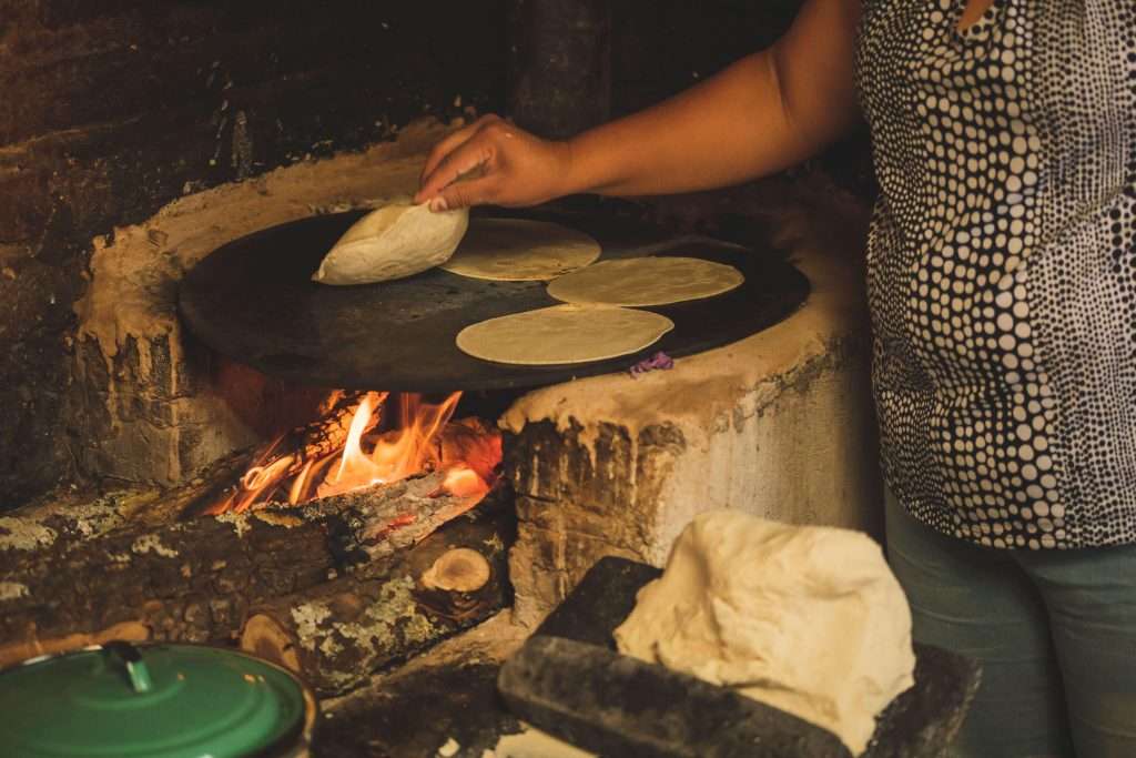 Tulum's Cultural Tapestry: An Immersive Experience 1 Making Tortillas Over Fire