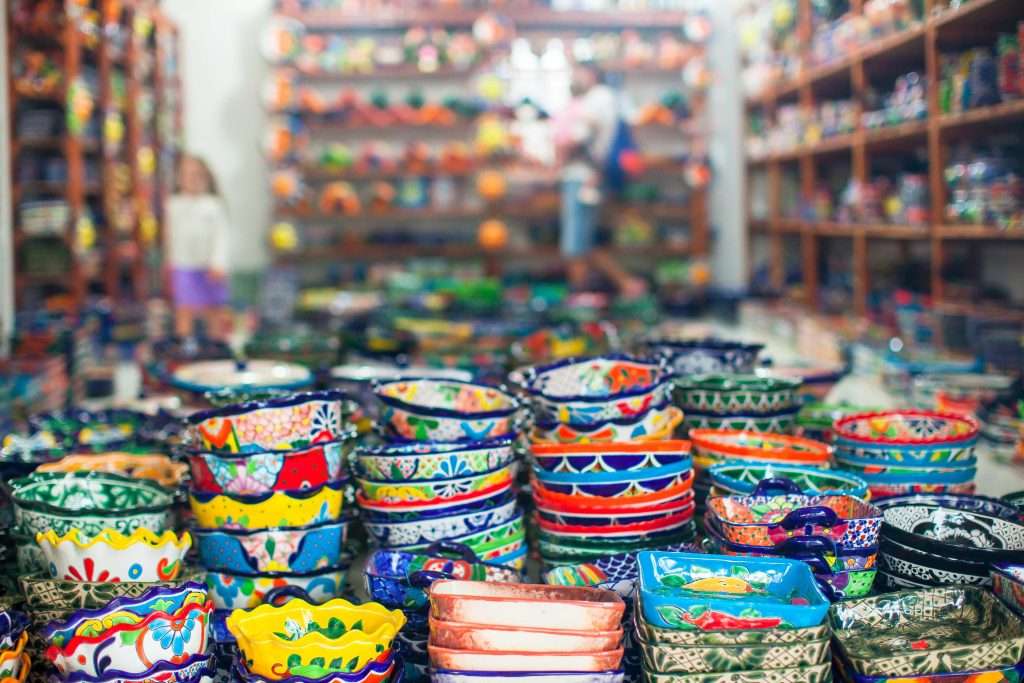 Easy Ways to Be an Eco-Tourist in Playa del Carmen (That Locals Actually Appreciate) 1 Mexican Pottery Vendor