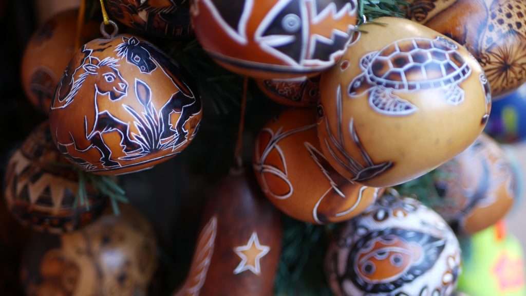 Beyond 5th Avenue: Hidden Shopping Spots in Playa del Carmen 4 Mexican painted ornaments