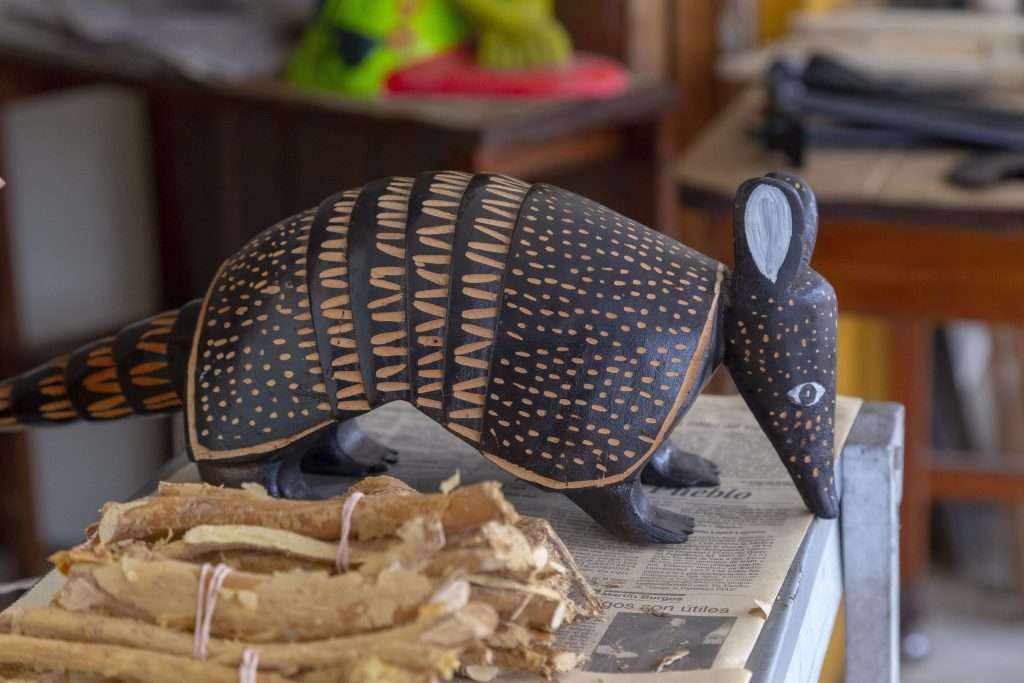 Boho Chic to Artisan Unique: Tulum's Shopping Scene 1 Armadillo carving