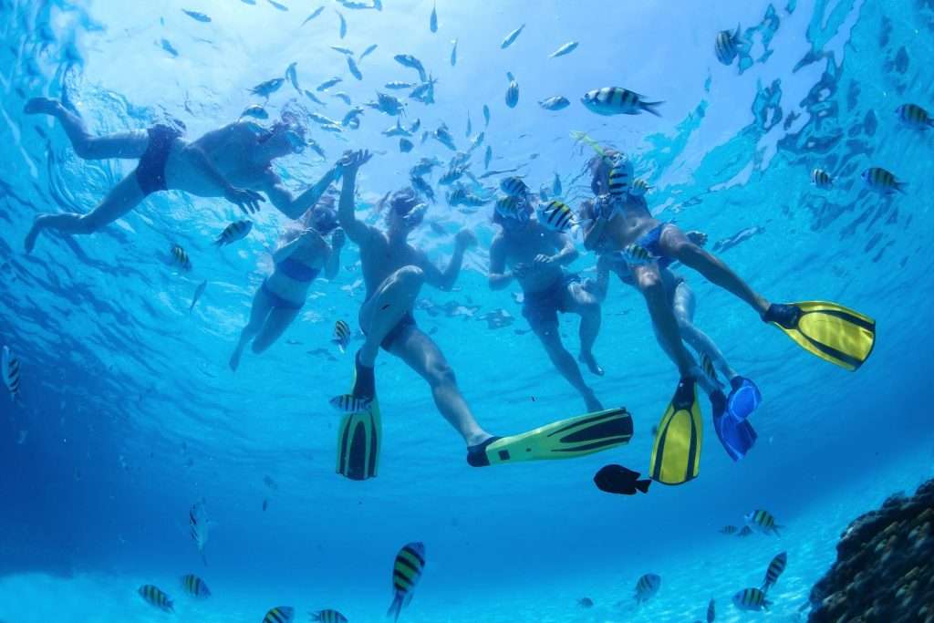 Sustainable Sanctuary: Akumal’s Commitment to Eco-Friendly Travel 1 Family snorkeling