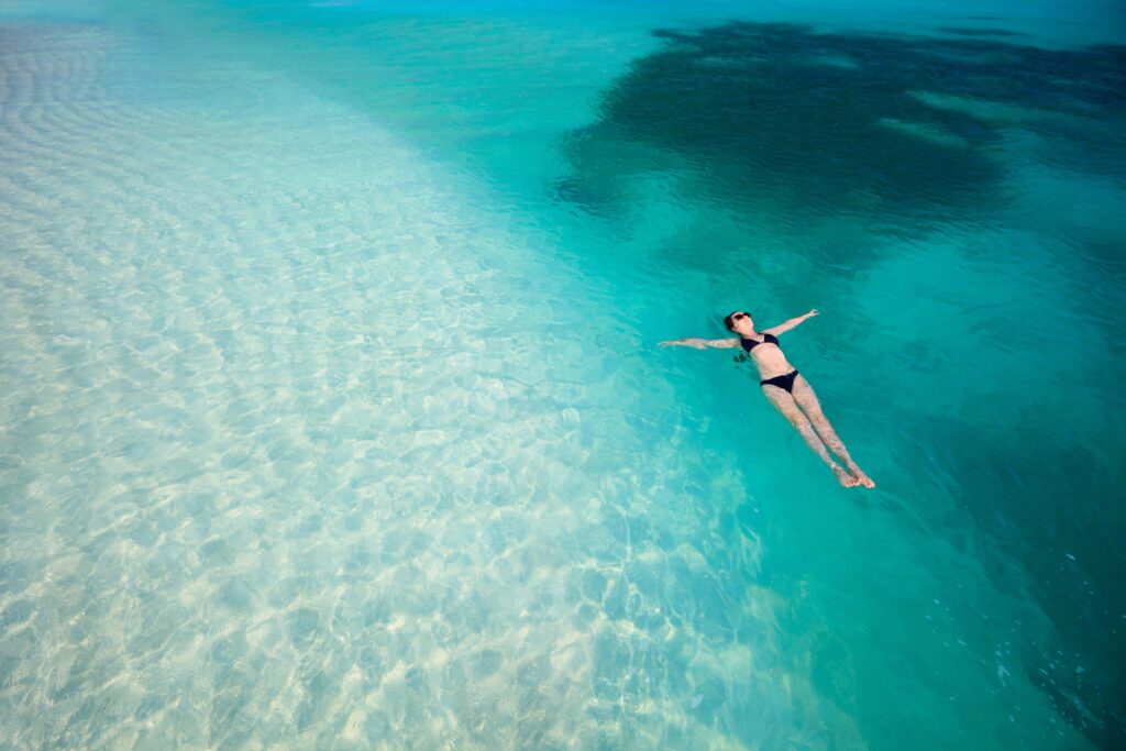 Floating in clear ocean